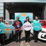 PEA ร่วมแสดงความยินดีกับผู้โชคดีได้รับรถยนต์ MG จากการจ่ายบิลค่าไฟฟ้าที่ Lotus's